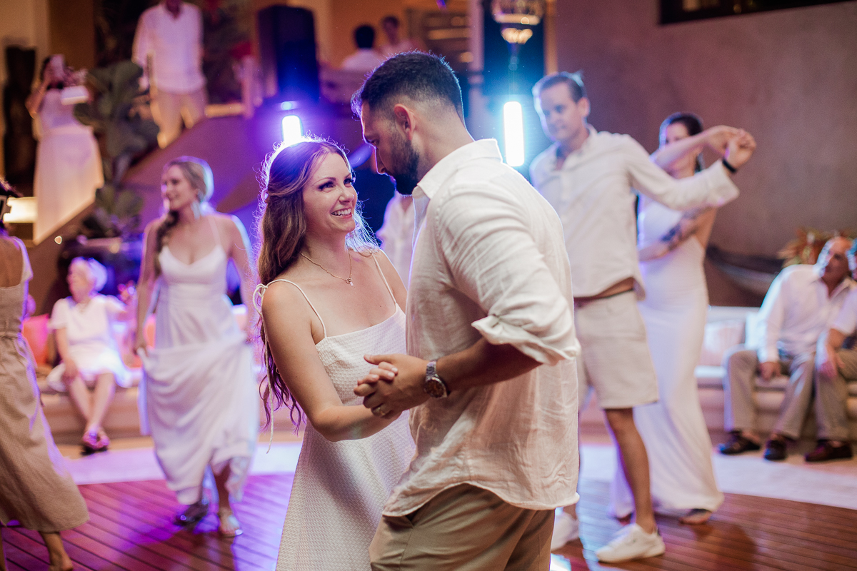 bride and groom dancing